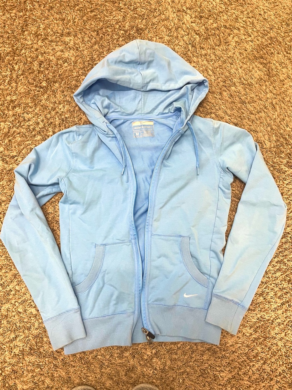 Light blue women’s Nike zip up jacket